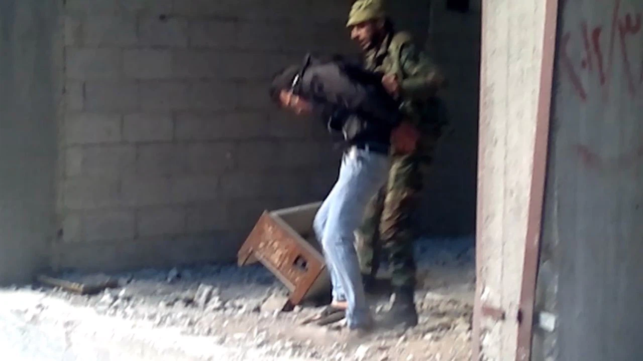 Suriye'de Esed rejiminin 2013'te en az 41 sivili öldürdüğü görüntüler ortaya çıktı