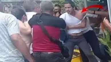 Muhalif lider Guaido restorandan yaka paça kovuldu