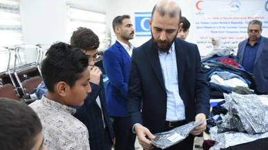 Türk Kızılay'dan Kerkük'teki ihtiyaç sahibi öğrencilere giyim yardımı!