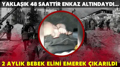 Elbistan'da 48 saat sonra kurtarılan 2 aylık bebek enkazdan elini emerek çıktı