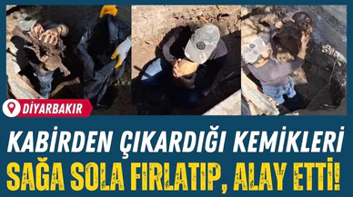 Mezardan çıkardığı kemikleri sağa sola fırlattı!
