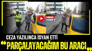 Ceza yazıldıktan sonra aracını yumrukladı: "Parçalayacağım bu aracı"
