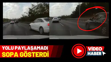 Yolu paylaşamadı, sopa gösterdi