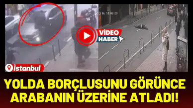 Yolda borçlusunu görünce arabanın üzerine atladı!